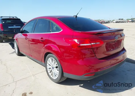 2017 Ford Focus Titanium from USA, damaged, VIN 1FADP3J24HL244488